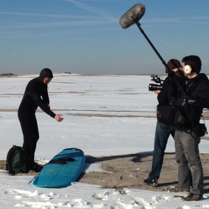 Vivienne Schiffer's crew filming Paul Takernmoto while he was surfing the Maryland coast in January
